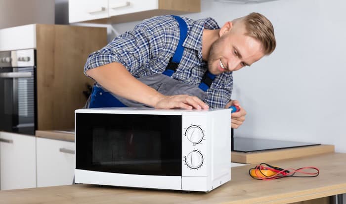 why does my ge microwave keep tripping the breaker