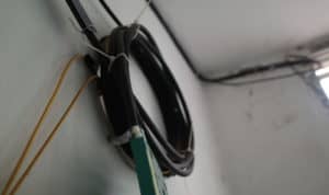 how to secure extension cord to wall